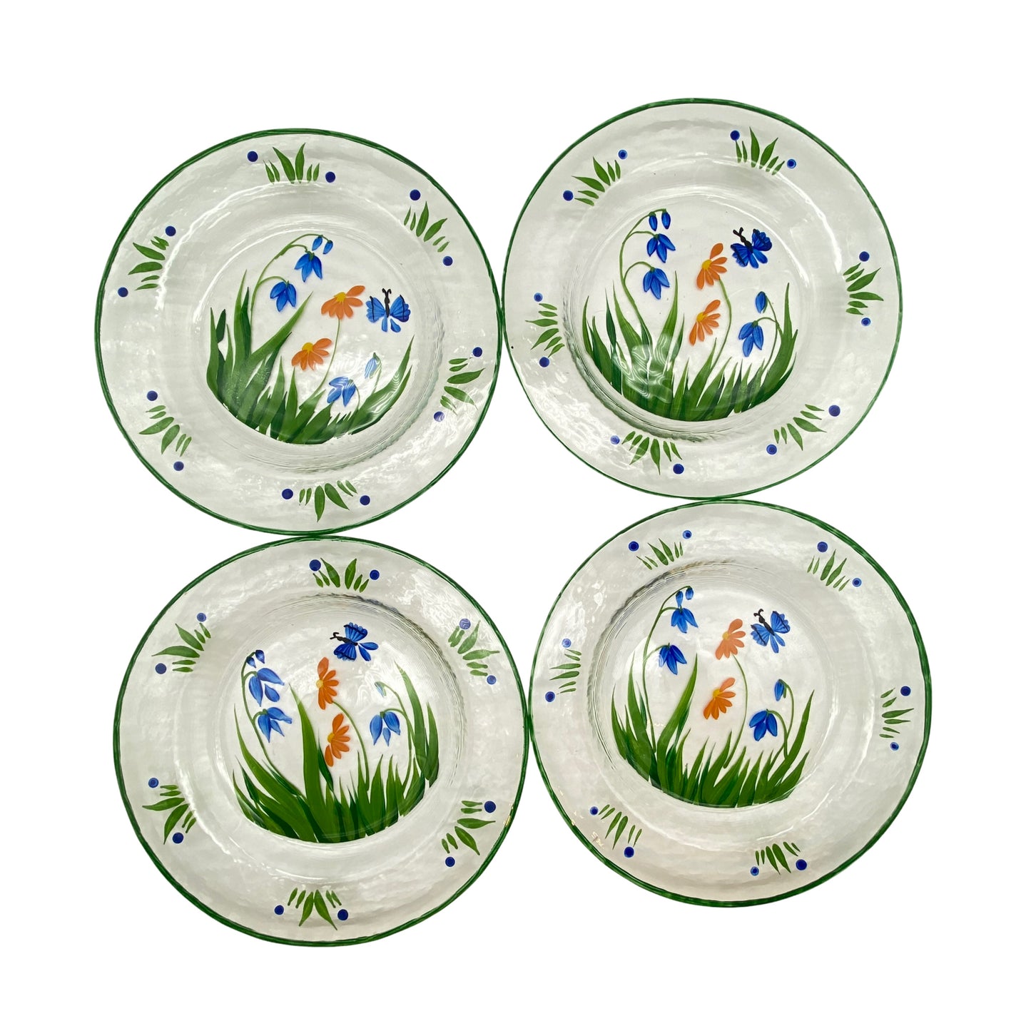 Diese Kanne aus Glas wurde handbemalt mit einer Blumenwiese in grün blau und gelb. Schön für Milch, Saft oder Wasser.