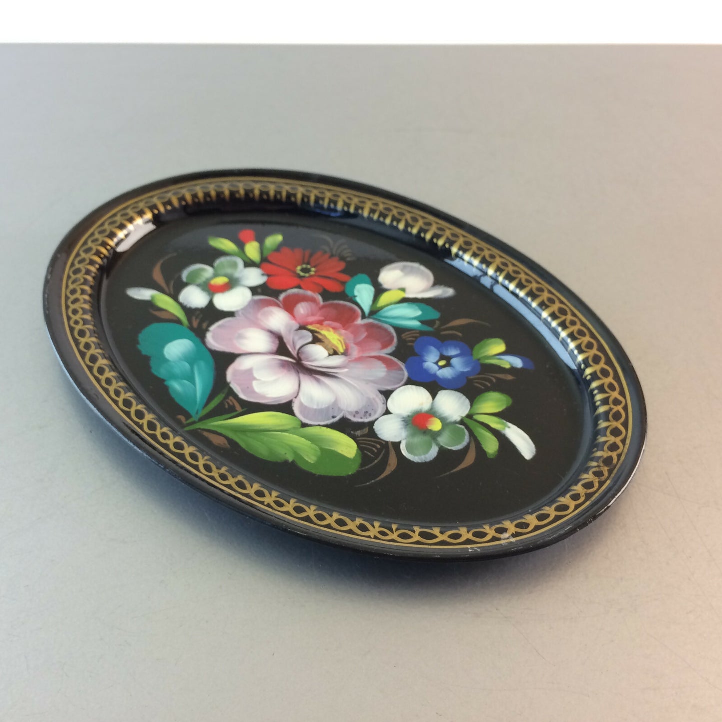 Tablett 17,3 cm bemalt Metall Blüten Blumen schwarz Gold Untersetzer