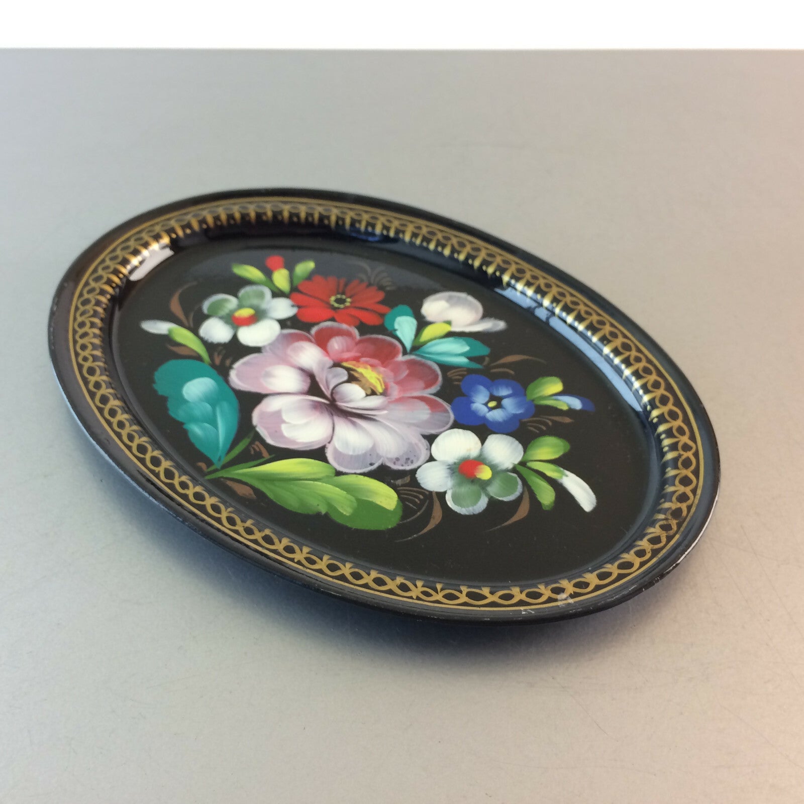 Tablett 17,3 cm bemalt Metall Blüten Blumen schwarz Gold Untersetzer